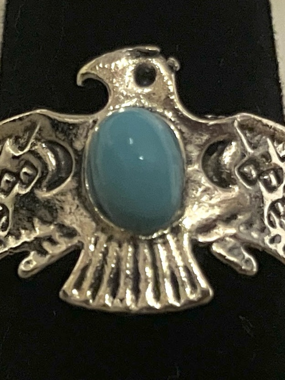 Silver Thunderbird Pendant with Turquoise Stone